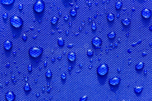 close-up-water-drops-pattern-over-blue-waterproof-cloth-close-up-water-drops-pattern-over-blue-waterproof-cloth-background-114627237